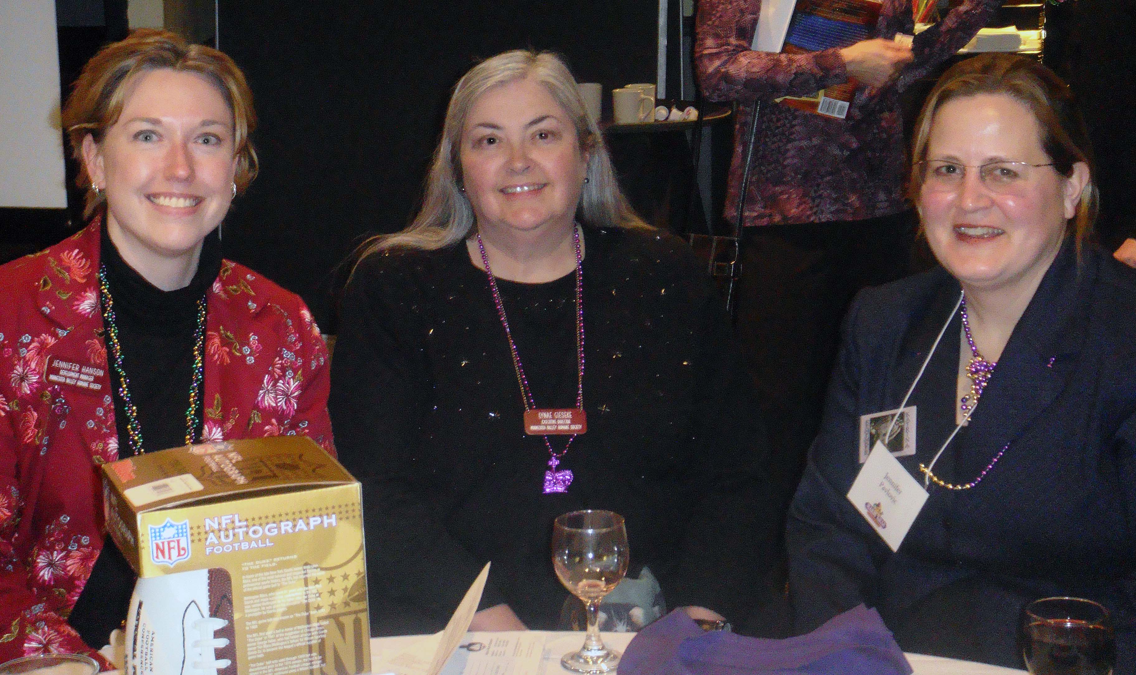 Jennifer, Lynae, and Jenny at the MVHS Mardi Gras Party for the Animals